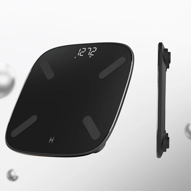 Black digital scale with digital display on a white background - okotoks hc pharmacy