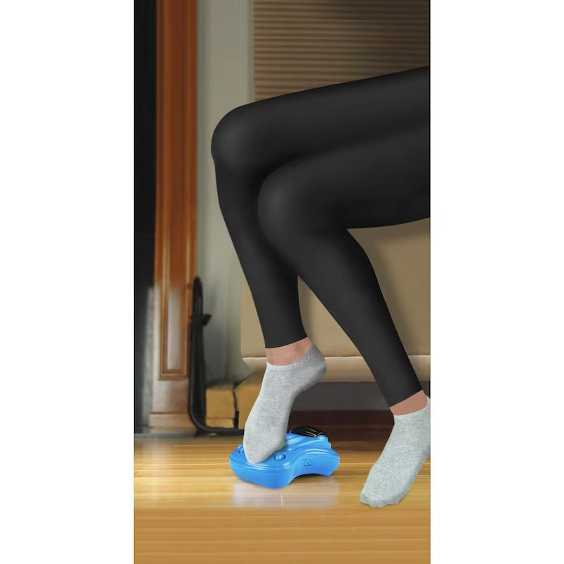 Person using Homedics Vibration Foot Massager on a wooden floor. - okotoks hc pharmacy