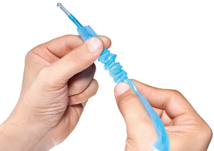 A close-up of a person's hands holding and stretching a translucent blue silicone sleeve or tube against a plain white background. - okotoks hc pharmacy