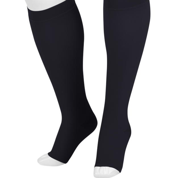 Black knee-high compression socks shown on a white mannequin leg form against a plain white background.  -okotoks hc pharmacy