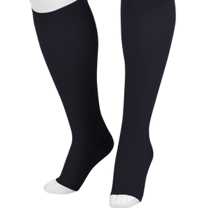 Black knee-high compression socks shown on a white mannequin leg form against a plain white background.  -okotoks hc pharmacy