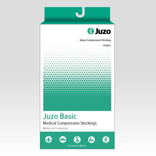 Juzo Basic medical compression stockings packaging, featuring a white box with a green halftone pattern and a hanging tab at the top, set against a light gray gradient background. - okotoks hc pharmacy