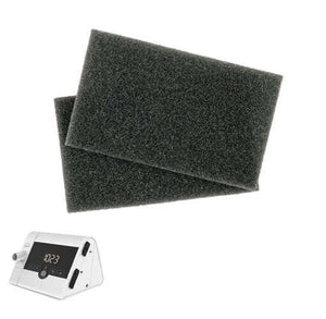 Two black foam filters on a white background with a cpap machine - okotoks hc pharmacy