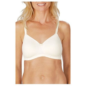 Woman wearing a white bra on a white background - okotoks hc pharmacy