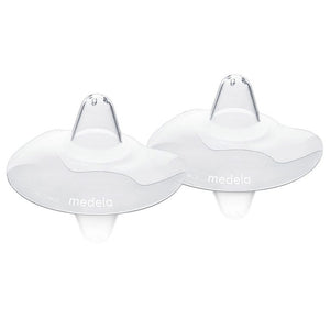 Two white Medela breastshields on a white background - okotoks hc pharmacy