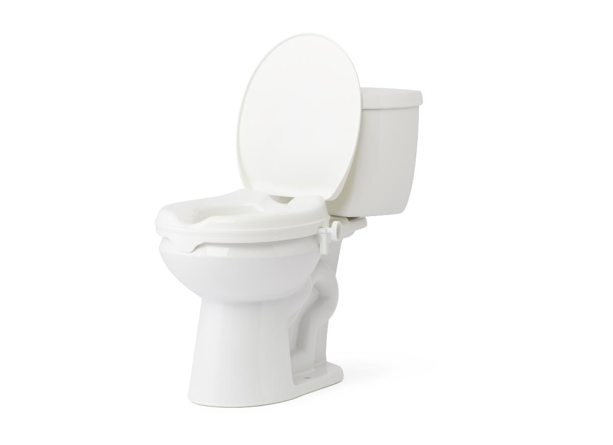 A white ceramic toilet with the lid open, shown from a three-quarter angle on a plain white background. - okotoks hc pharmacy