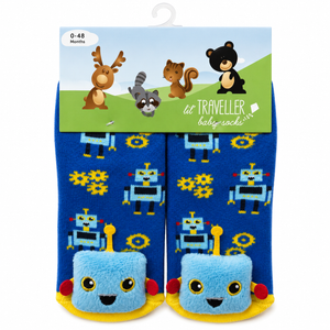 A pair of baby socks in blue with a robot pattern, packaged on a hanger card. The socks feature a plush light blue robot face on the toes, yellow wheels, and small red accents. - okotoks hc pharmacy