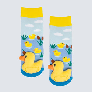 Pair of socks with rubber duck design on a light blue background - okotoks hc pharmacy
