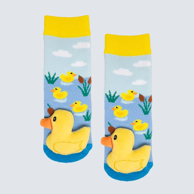 Pair of socks with rubber duck design on a light blue background - okotoks hc pharmacy