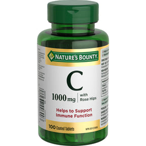 Green bottle of Nature's Bounty Vitamin C supplement on a white background - okotoks hc pharmacy