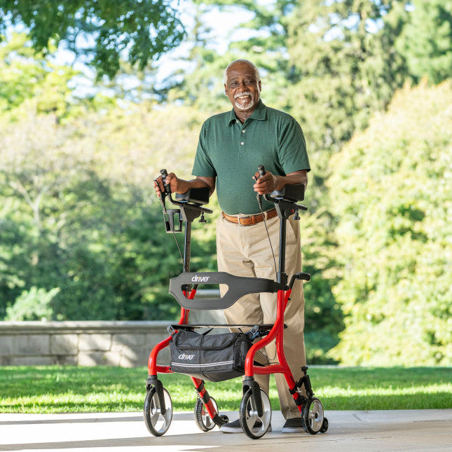 Man using a rollator in a park setting - okotoks hc pharmacy