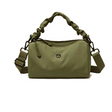 Green handbag on a white background - okotoks hc pharmacy