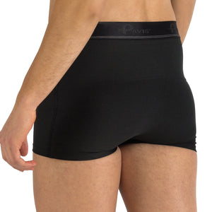 Rear view of a person wearing black high-waisted briefs with a dark gray waistband featuring the Pavis logo. - okotoks hc pharmacy