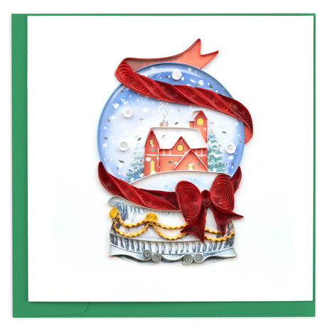 Decorative card with a snow globe design featuring a house and red ribbon on a white background. - okotoks hc pharmacy