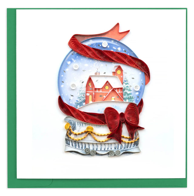 Decorative card with a snow globe design featuring a house and red ribbon on a white background. - okotoks hc pharmacy