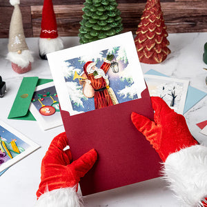 Person wearing red gloves holding a Christmas card with Santa Claus, surrounded by festive decorations. - okotoks hc pharmacy