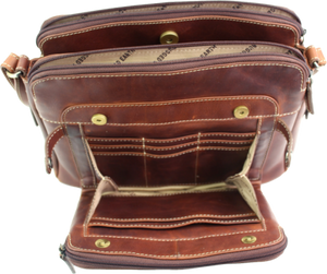 Brown leather bag with visible stitching and gold hardware on a white background - okotoks hc pharmacy