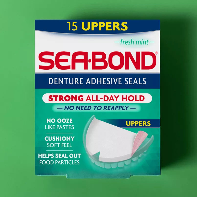 A box of Sea-Bond Denture Adhesive Seals, 15 uppers, in fresh mint flavor, shown against a solid green background. - okotoks hc pharmacy