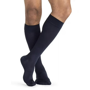 Navy knee-high socks worn by a person on a white background - okotoks hc pharmacy