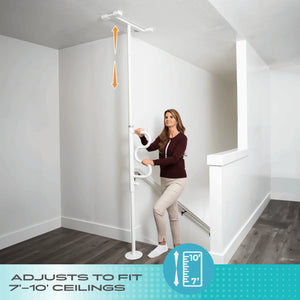 Woman adjusting a white ceiling-mounted storage system in a room with wooden flooring and white walls. - okotoks hc pharmacy