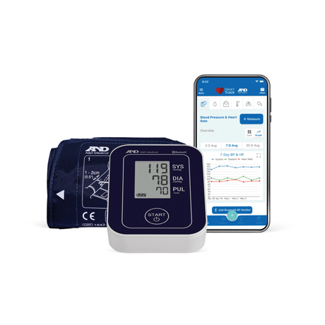 Blood pressure monitor with digital display and smartphone showing blood pressure app on a white background - Okotoks HC Pharmacy