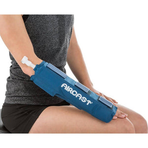 Person using a blue Aircast compression device on their arm. - okotoks hc pharmacy