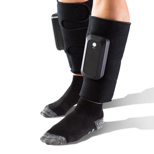 Black leg compression device on a person's legs with a white background - okotoks hc pharmacy