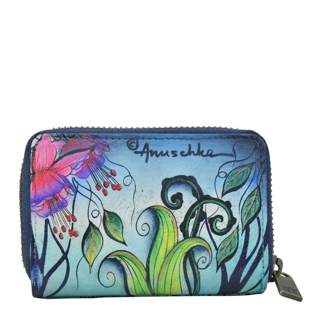 Colorful wallet with floral design and 'Anuschka' branding on a white background - okotoks hc pharmacy