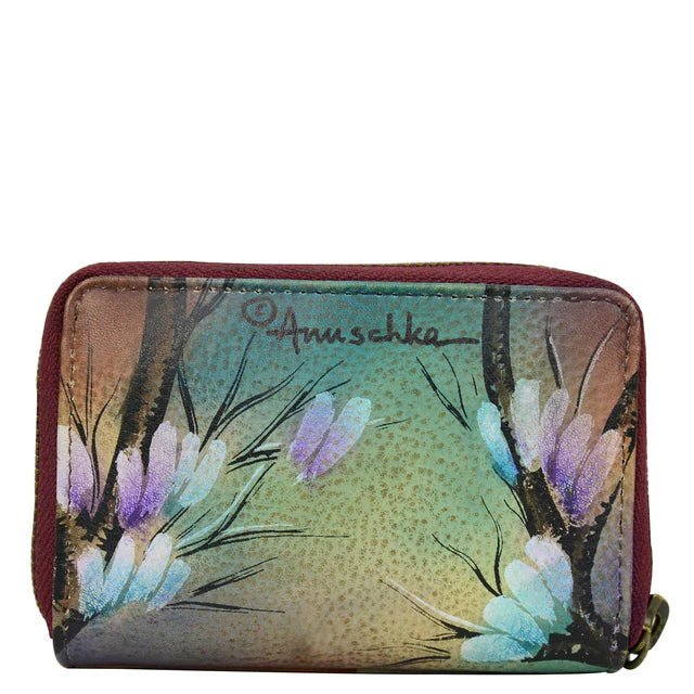 Small wallet with floral design and 'Anuschka' branding on a white background - okotoks hc pharmacy