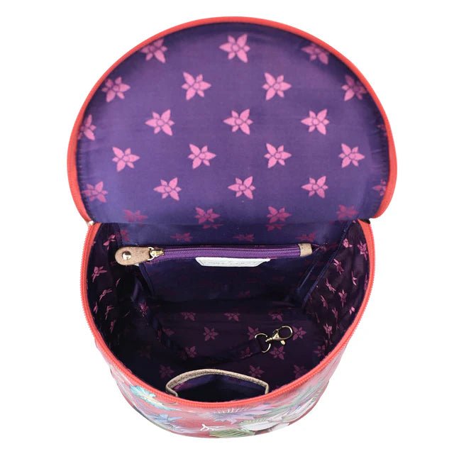 Open bag with purple interior and pink floral pattern on a white background - okotoks hc pharmacy