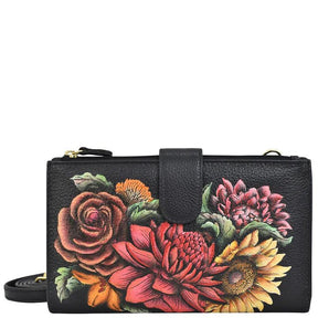 Black wallet with floral designs on a white background - okotoks hc pharmacy