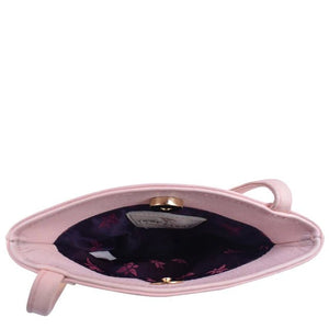 Pink handbag with a dark interior on a white background - okotoks hc pharmacy