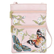 Pink crossbody bag with butterfly and floral design on a white background - okotoks hc pharmacy