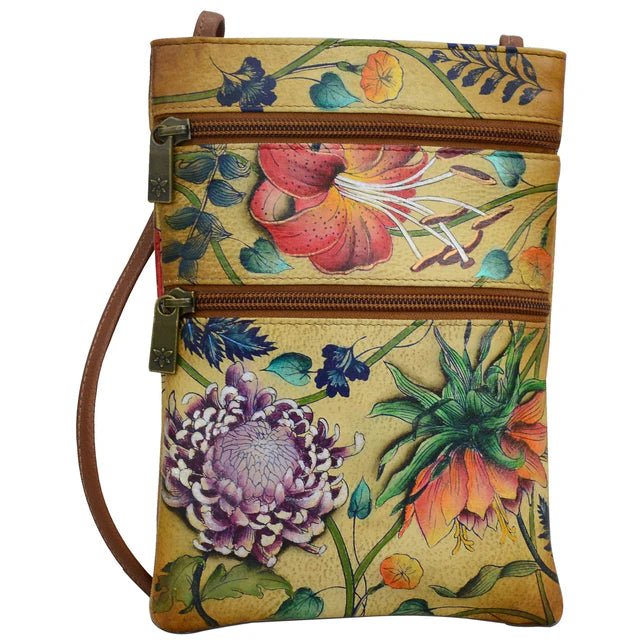 Floral-patterned crossbody bag with a strap on a white background - okotoks hc pharmacy
