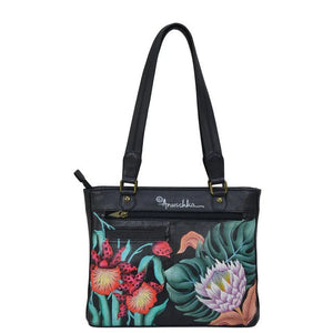 Handbag with floral design on a white background - okotoks hc pharmacy