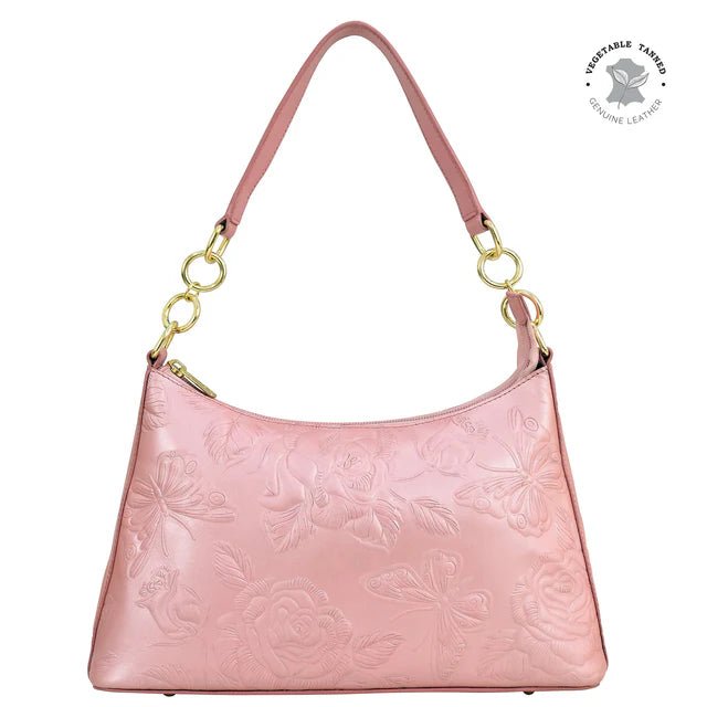 Pink handbag with floral embossing on a white background - okotoks hc pharmacy