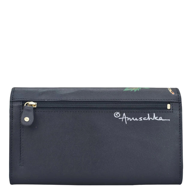 Black pouch with gold zipper and 'Anuschka' branding on a white background - okotoks hc pharmacy