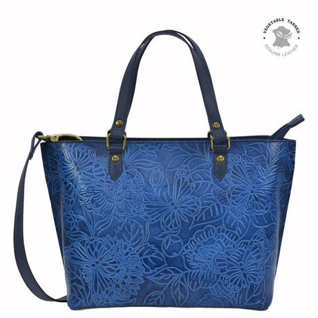 Blue floral-patterned handbag with a strap on a white background - okotoks hc pharmacy