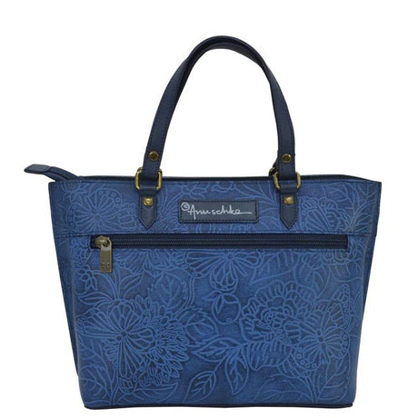 Blue floral-patterned handbag with gold accents on a white background - okotoks hc pharmacy