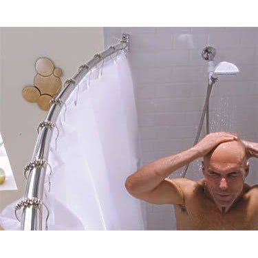 Person using a shower head with a curved shower curtain rod in a bathroom. - okotoks hc pharmacy