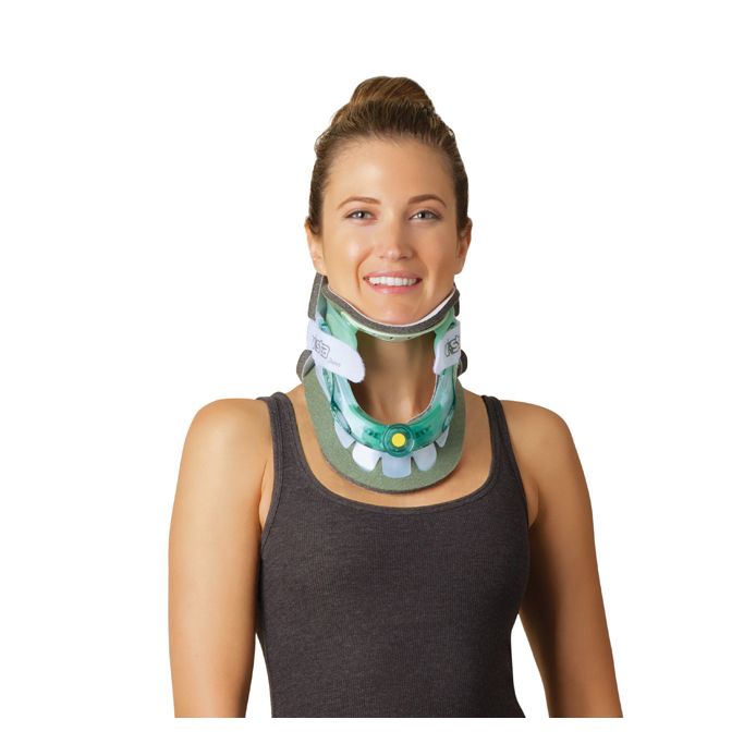 Woman wearing a green neck brace against a white background - okotoks hc pharmacy