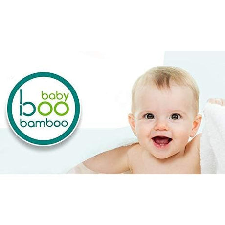 Baby with a happy expression next to the 'baby boo bamboo' logo on a white background - okotoks hc pharmacy