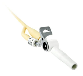 A medical catheter connector with a beige/cream plastic sheath, a white plastic connector tip, and a silver metal clamp with a black center, shown on a plain white background. - okotoks hc pharmacy