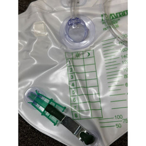 Medical device with a clear plastic bag and green measurement markings on a dark background - okotoks hc pharmacy