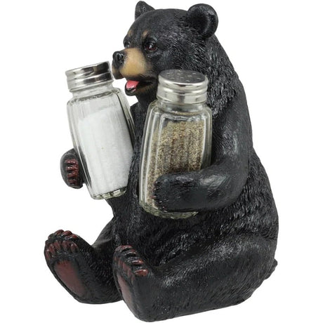 Bear figurine holding salt and pepper shakers on a white background - okotoks hc pharmacy