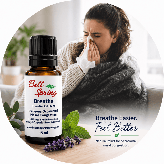 Bell Spring Breathe essential oil bottle shown next to a woman snezing on a couch, with text reading 'Breathe Easier. Feel Better. - okotoks hc pharmacy