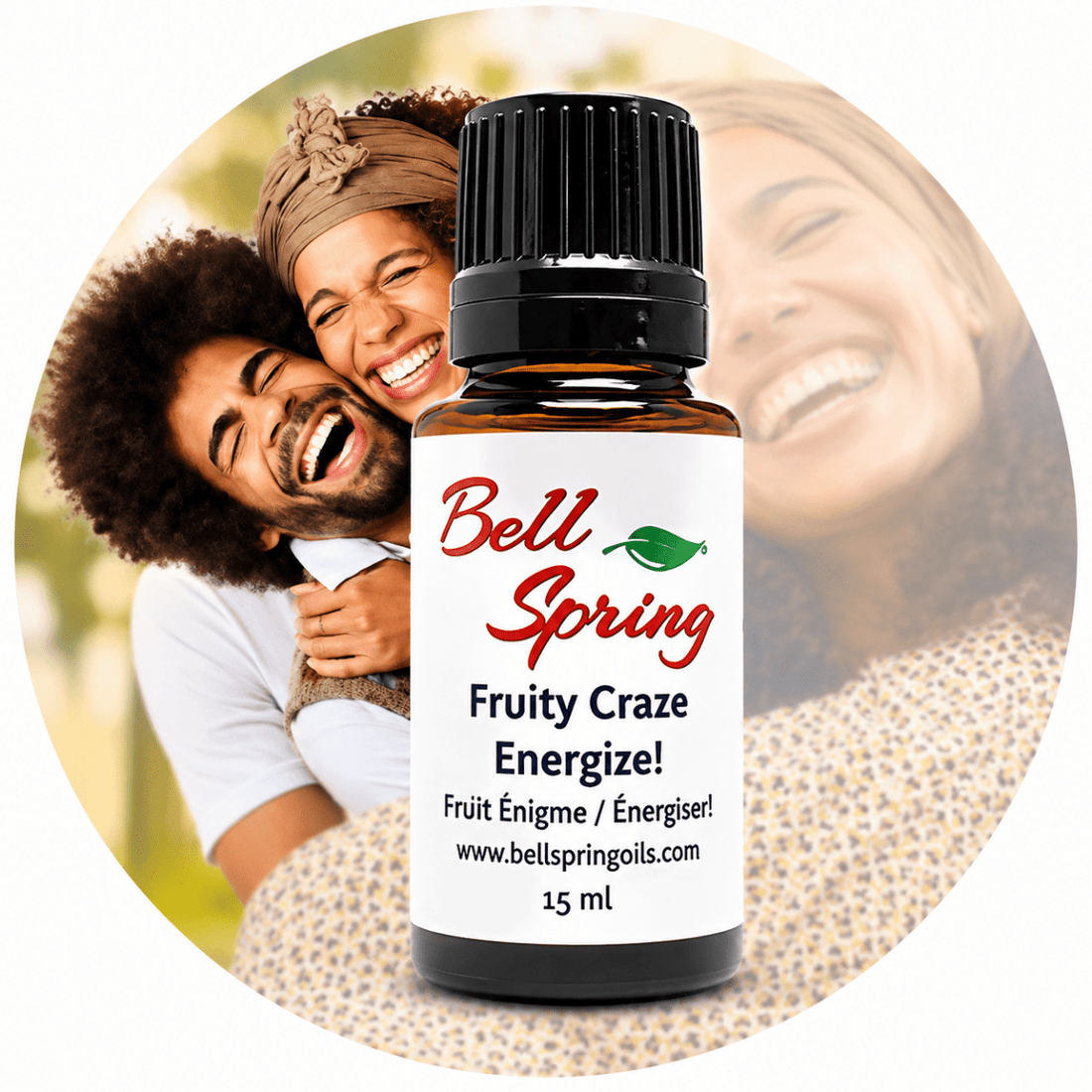 A 15 ml bottle of Bell Spring 'Fruity Craze Energize!' essential oil centered over a circular background photo of a smiling couple, with the product label clearly visible. - okotoks hc pharmacy