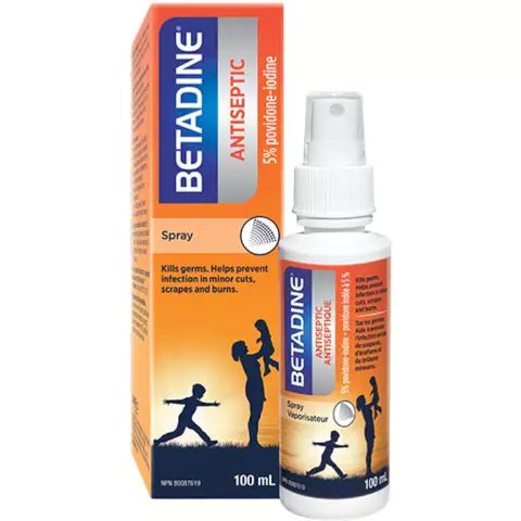 Betadine antiseptic spray bottle and packaging on a white background - okotoks hc pharmacy