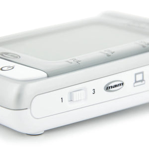 White electronic device with buttons and 'mam' branding on a white background - okotoks hc pharmacy