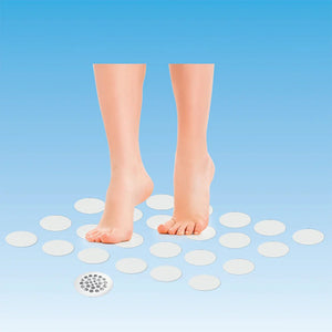 Feet stepping onto circular white pads arranged in a pattern on a blue background - okotoks hc pharmacy